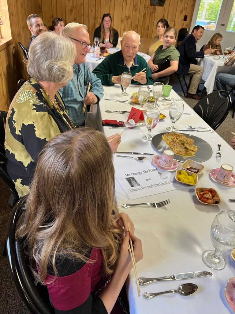 People at tables eating